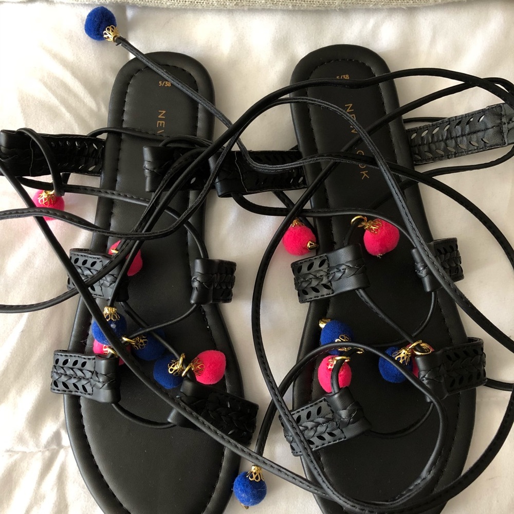 Never worn pompom wrap sandals